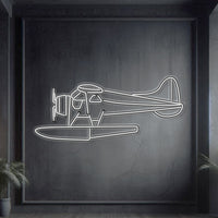 De Havilland DHC‑2 Beaver neon silhouette wall art, laser-cut steel with classic floatplane profile and sculptural 3D neon glow