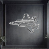 F‑35A Lightning II angle-view neon silhouette wall art, laser‑cut steel with bold neon outline and dramatic 3D elevation