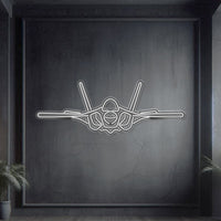 F‑35A Lightning II front-view neon silhouette wall art, laser‑cut steel with glowing neon outline and dynamic 3D elevation
