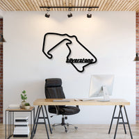 Metal circuit wall art featuring Silverstone Formula 1 track elevating garage décor